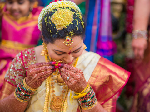 A candid moment of an Indian bride during Wedding; Wedding photographers; Wedding photos;